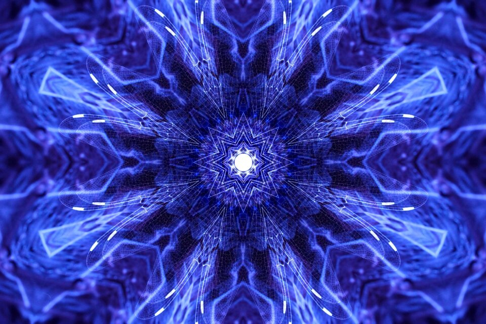 Blue, purple, and black patterned DMT visuals, spiraling outwards from a white focal point.