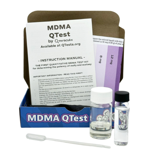 A blue MDMA QTest kit with instructions, vials, and color chart to test for pure MDMA.