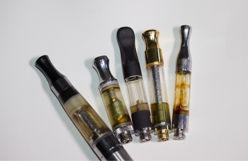 DMT vape carts displayed on a table 